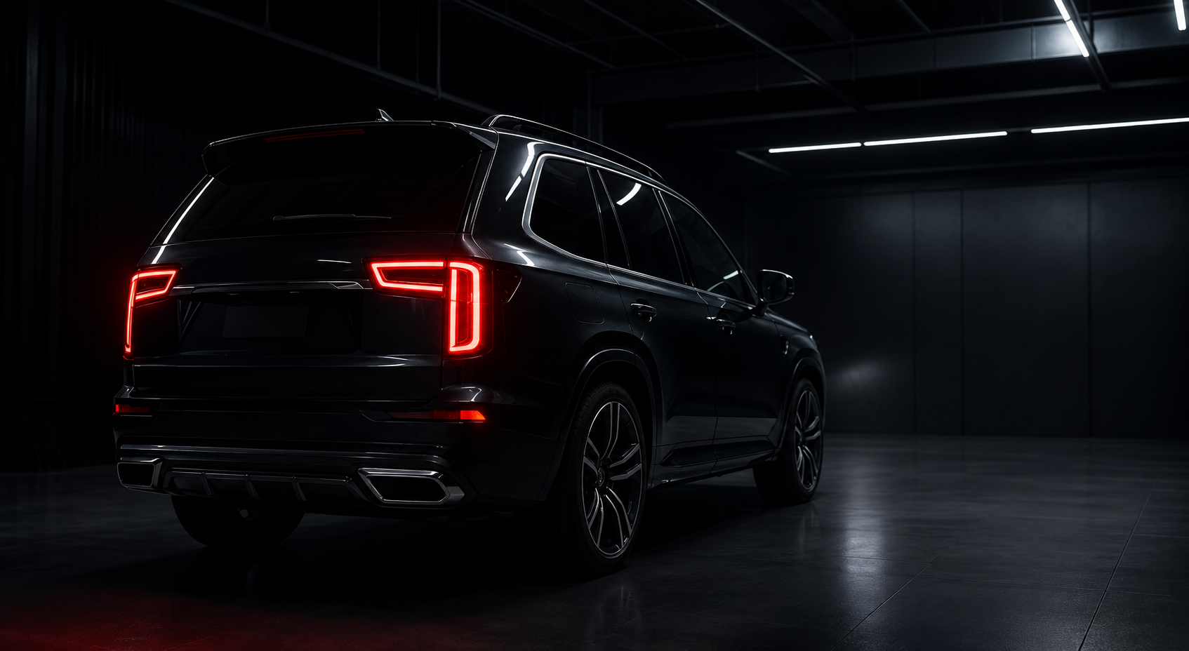 Dark SUV rear with red tail lights